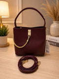Sac bucket bordeaux - vue de face avec verrou doré
